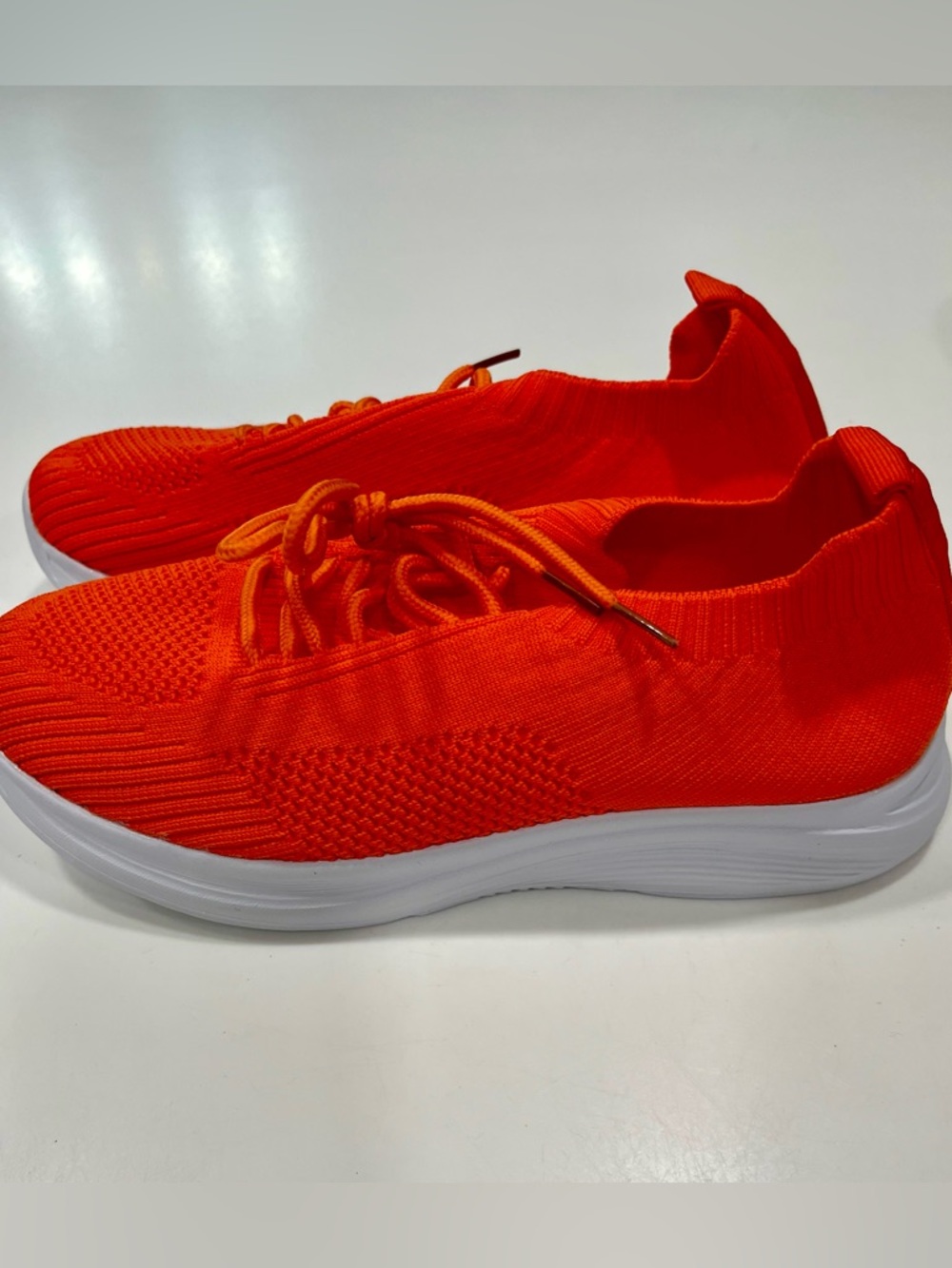 New Bright Orange Knit Slip-On Sneakers. Never worn.